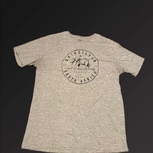 This shirt is gray and amazing quality and the brand is quicksilver